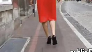 Woman In A Red Dress Walking Around